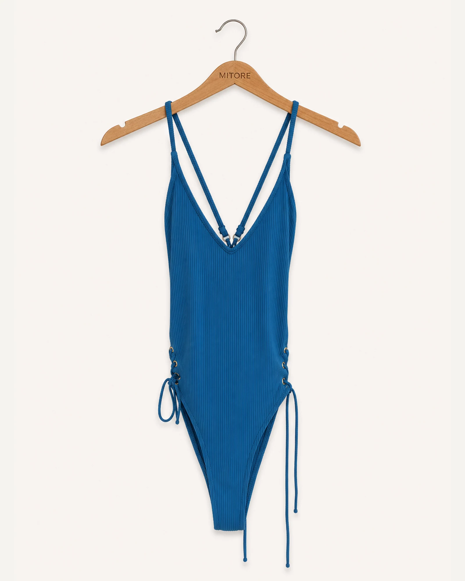 Vista frontal de traje de baño cloud nine azul y verde azulado talla s