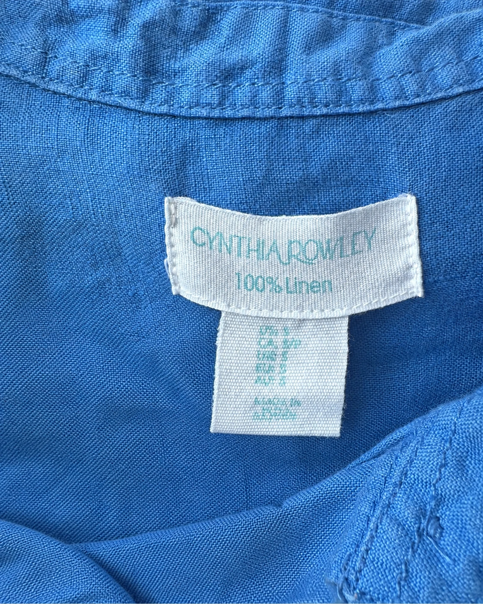 Etiqueta original de marca y talla de camisa o top cynthia rowley azul talla por confirmar
