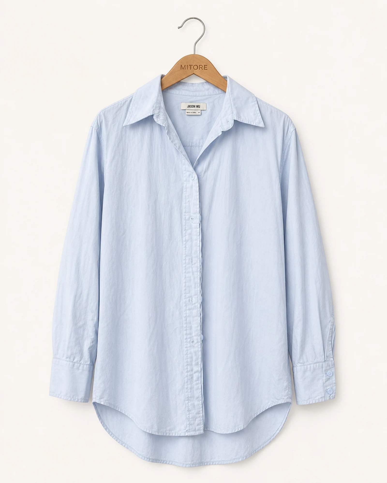 Vista frontal de camisa o top jason wu light blue y blanco talla xs