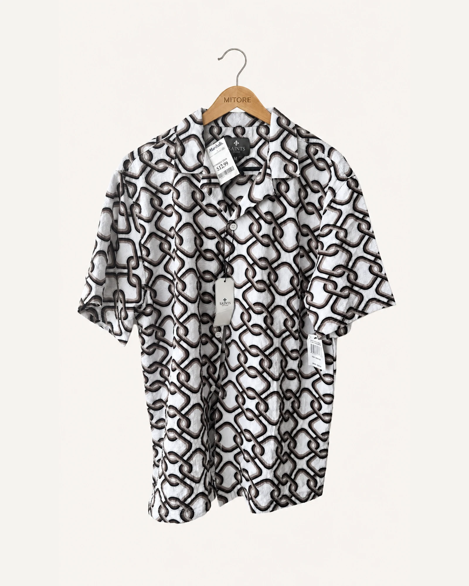 Vista frontal de camisa o top saints studio negro, blanco y café talla m
