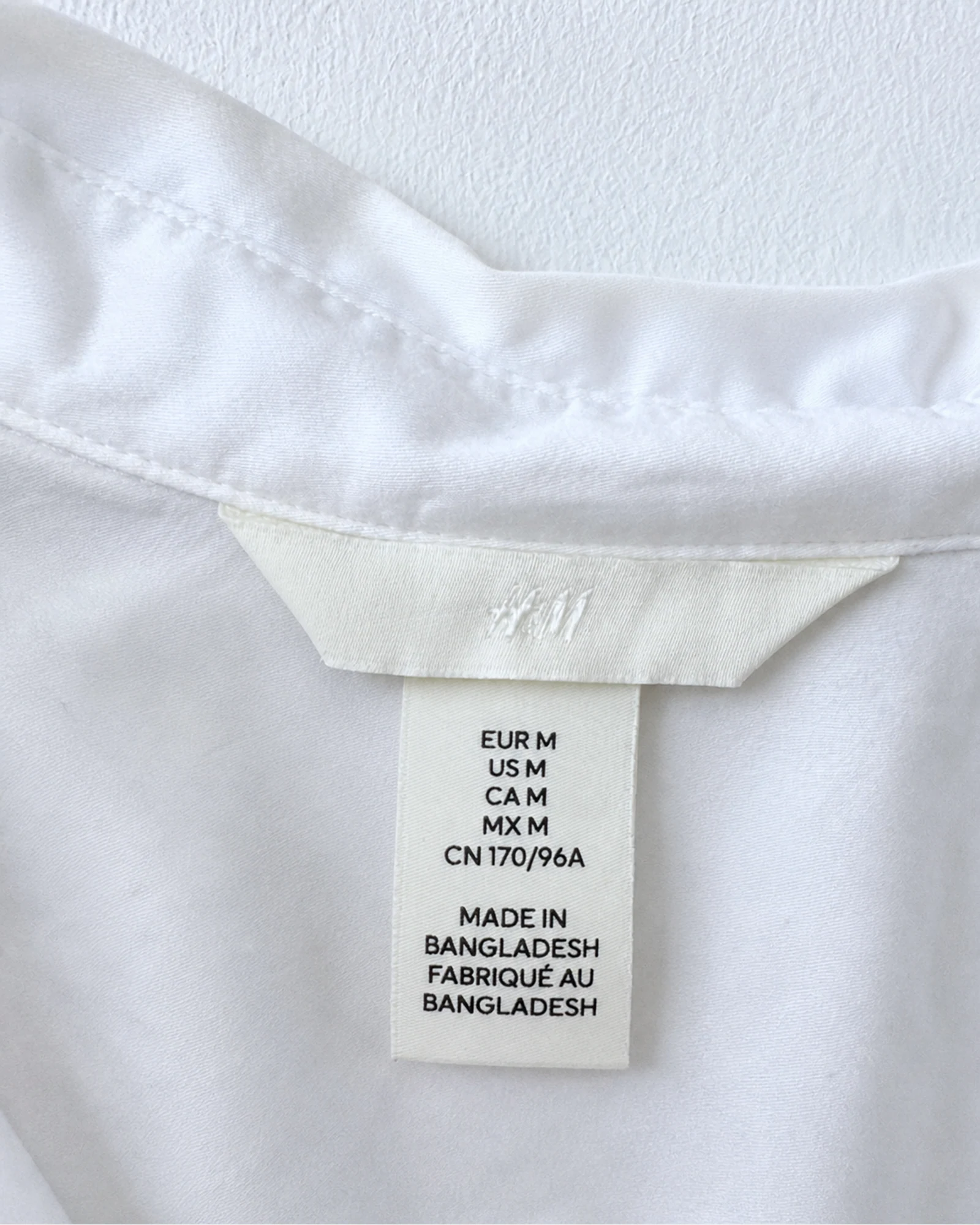 Etiqueta original de marca y talla de camisa o top h&m blanco talla eur m / us m / ca m