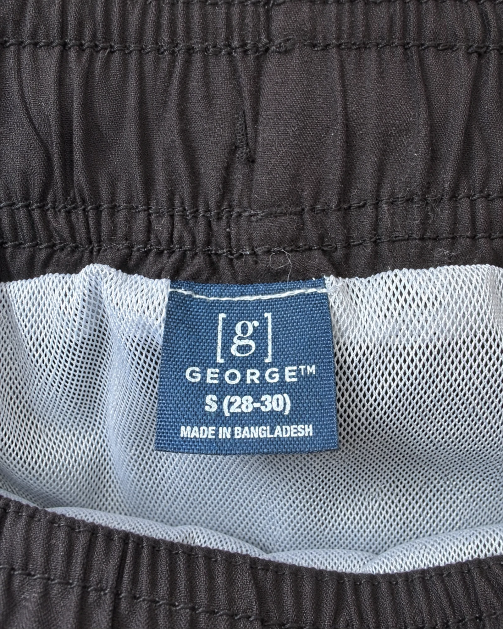 Etiqueta original de marca y talla de short george dark brown y negro talla s (28-30)