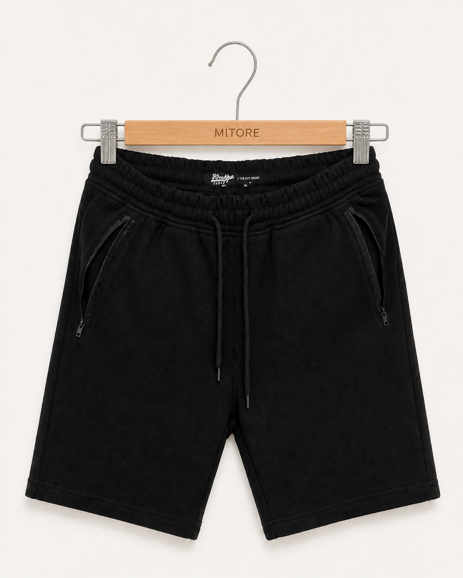 Vista frontal de short brooklyn cloth negro y charcoal talla s