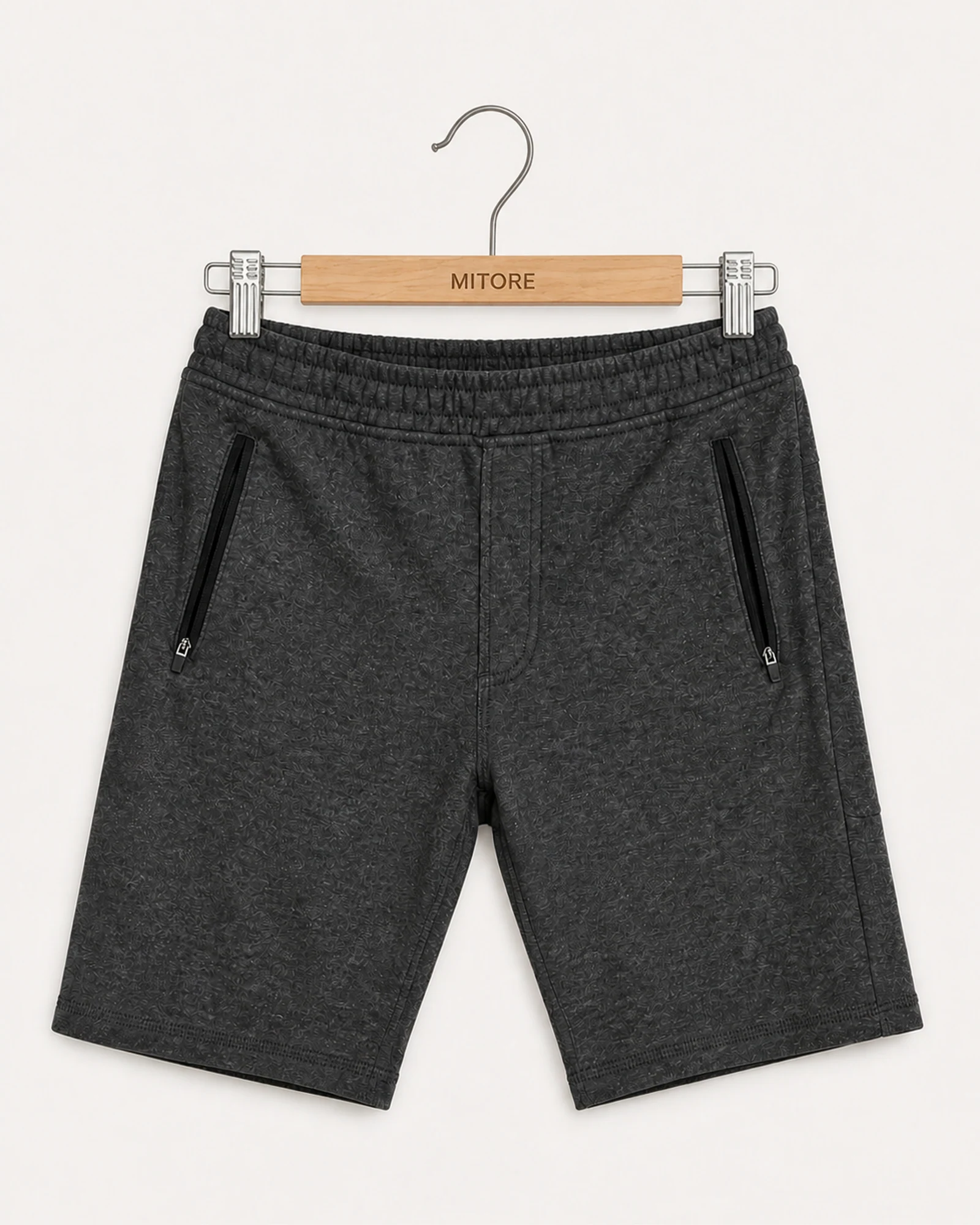 Vista frontal de short monument gris talla s