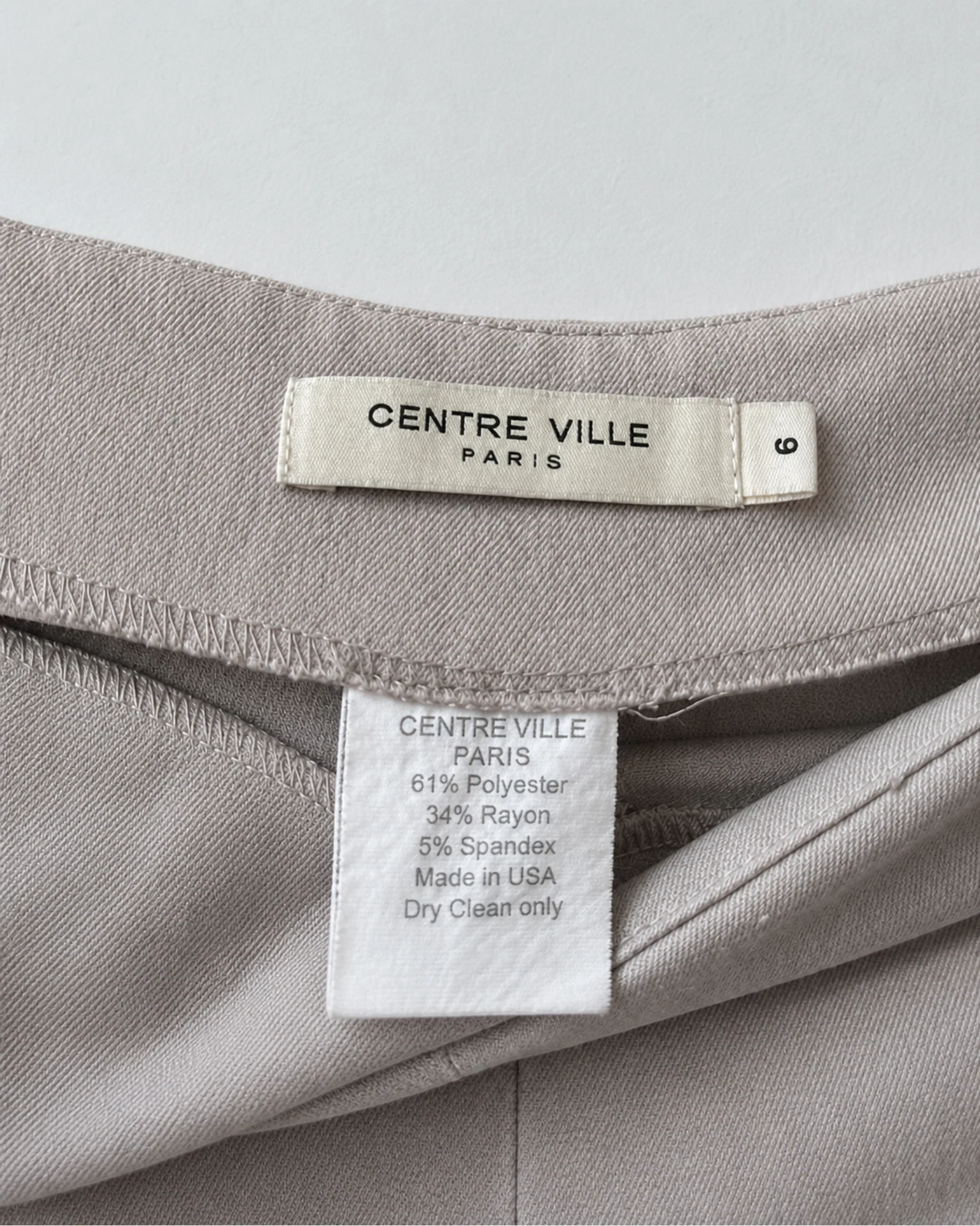 Etiqueta original de marca y talla de leggings centre ville paris topo y beige talla s
