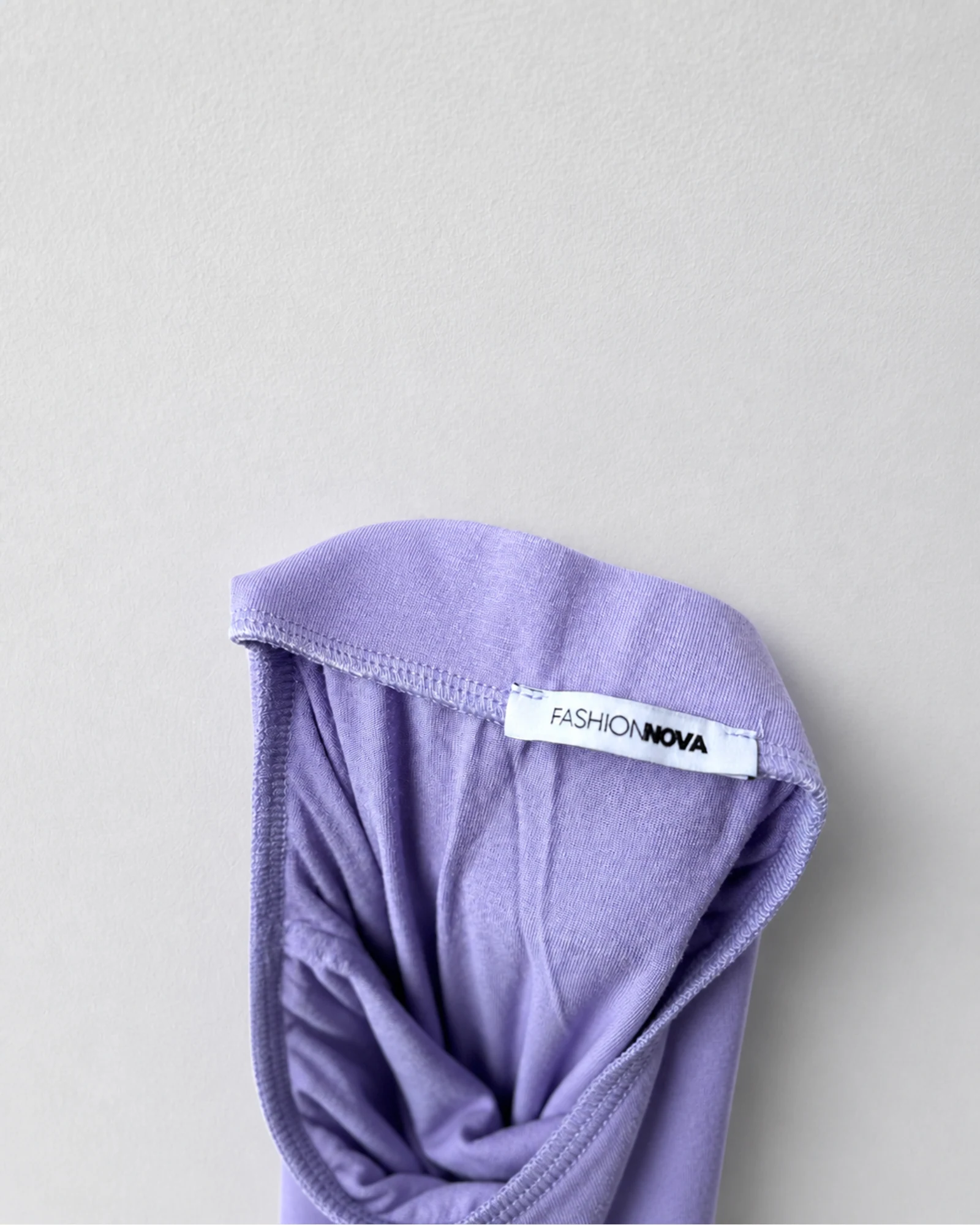 Etiqueta original de marca y talla de falda fashion nova lavender talla por confirmar